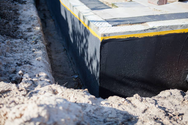 Professional Waterproofing technician working in Westwood, PA